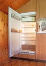 Old fridge in a dated kitchen Royalty Free Stock Photo