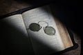 An Old Open Holy Bible from 1882 on Wooden Table