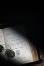 An Old Open Holy Bible from 1882 on Wooden Table