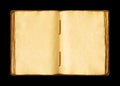 Old open medieval book with worn parchment pages. Isolated on black background