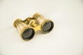 Old opera binoculars isolated on a white background Royalty Free Stock Photo