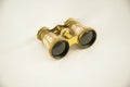 Old opera binoculars isolated on a white background Royalty Free Stock Photo