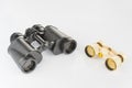 Old opera glass and modern binoculars Royalty Free Stock Photo
