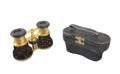 Old opera glasses and case isolated.