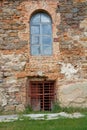 Old orange brick wall with windows Royalty Free Stock Photo
