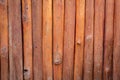 Old orange/brown log wall texture Royalty Free Stock Photo