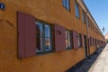 Old charming orange row houses in Copenhagen, Denmark