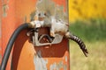 Old Orange Diesel Pump With Nozzle Royalty Free Stock Photo