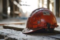 old orange hard hat at construction site for safety concept Royalty Free Stock Photo