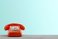 Old orange retro rotary telephone Royalty Free Stock Photo