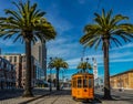 Old orange San Francisco cable car on the Embrcadero with the Fe