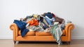 Old orange sofa full of clothes, blankets, scarfs, etc. Messy room. Heap of disorganized clothing on a couch. Generative AI