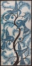 old oriental batik fabric, decorated with stylized birds on a tree Royalty Free Stock Photo