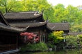 Old oriental structures with garden and fish pond