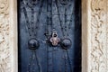 Old ornate church door with a lock Royalty Free Stock Photo