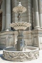 Old ornate fountain in palace grounds