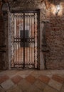 Old ornate gate with street lamp in an inner court of a historical palace in Venice, Italy Royalty Free Stock Photo