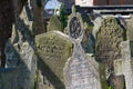 Old gravestones in the historic South Ealing Cemetery, Victorian burial ground in west London UK.