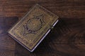 Old ornate notebook on wood background Royalty Free Stock Photo