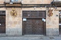 Old ornate solid wood door that is the entrance to a pub called Gatsby on Bordadores Street