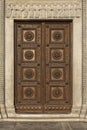 Old ornate wooden door with beautiful carvings Royalty Free Stock Photo