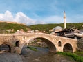 Old Ottoman bridge and mosque in Prizren, Kosovo just before sunset Royalty Free Stock Photo