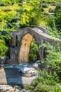 Old ottoman bridge Ura e Mesit near village Boks in Albania Royalty Free Stock Photo