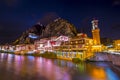 Old Ottoman houses evening colorful lights view by the Yesilirmak River in Amasya City. Amasya is populer tourist destination in a Royalty Free Stock Photo