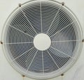 Old outdoor AC fan with white color and good lighting, scratches and rust