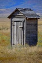 Old Outhouse in Ghost Town Countryside Abandoned Historical Area Royalty Free Stock Photo