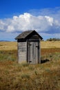 Old Outhouse in Ghost Town Countryside Abandoned Historical Area Royalty Free Stock Photo