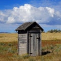 Old Outhouse in Ghost Town Countryside Abandoned Historical Area Royalty Free Stock Photo