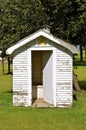 Old outhouse with open door