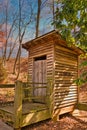 Old Outhouse in Woods Royalty Free Stock Photo