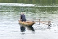 Old outrigger canoe in South Pacific lagoon Royalty Free Stock Photo