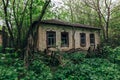 Old overgrown abandoned house in abandoned Russian village