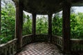 Old overgrown balcony in old abandoned mansion Royalty Free Stock Photo