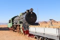 Old Pacific type Steam locomotive in desert