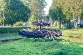 Old paddle wheel at lowest place in the Netherlands Royalty Free Stock Photo