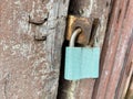 Old padlock. Background with old blue door lock Royalty Free Stock Photo