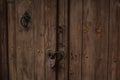 Old padlock at one wooden door Royalty Free Stock Photo