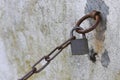 Old padlock on a rusted chain Royalty Free Stock Photo