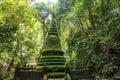 Old pagoda attached by moss at Phlio waterfall park, Chanthaburi