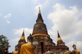 Old Pagodas With Buddhas Statue And Cloudy Sky