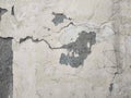 Old paint.Abstract paint peeling off wall.Grunge Paint Peeling Texture.Light concrete wall with cracks. Royalty Free Stock Photo