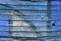 Old Paint Blue And Yellow Color On A Dirty Wooden Surface Royalty Free Stock Photo