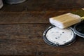 Old Paint Can Lids and Paint Brush Royalty Free Stock Photo