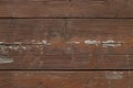 Wood texture with scratches and knots. View from aboveOld painted board of red color. Royalty Free Stock Photo