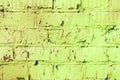 Old painted brick wall brown and green colors. Abstract background Royalty Free Stock Photo
