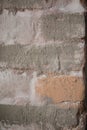 Old painted brick wall fragment. Background, texture. Royalty Free Stock Photo